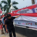 Gebyar bentang bendera merah putih sepanjang 77 meter di depan istana Maimoon medan (Dok Ist)