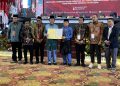 Foto Bersama Ketua dan Anggota KPU Provinsi Jambi dan pasangan Gubernur Jambi Terpilih (Dok Foto:/red)