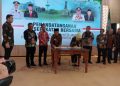 Tampak Pj Walikota Jambi dan Pj Bupati Merangin menandatangani nota kesepahaman (MoU) (Dok Foto:Chr)