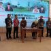 Tampak Pj Walikota Jambi dan Pj Bupati Merangin menandatangani nota kesepahaman (MoU) (Dok Foto:Chr)